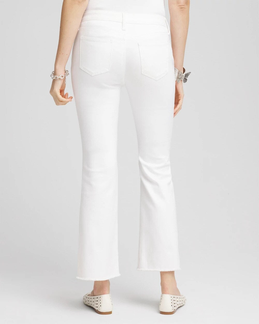 Chico's Women | Petite No Stain Girlfriend Fray Hem Kick Flare Jeans ALABASTER